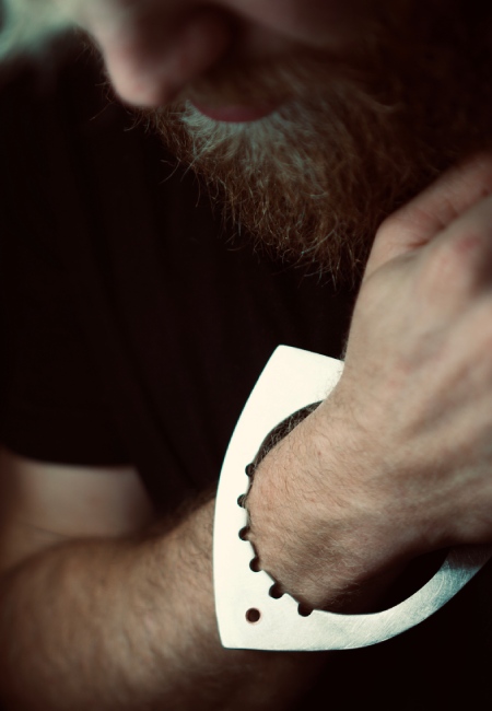 male model showing Dhoek pewter bangle
