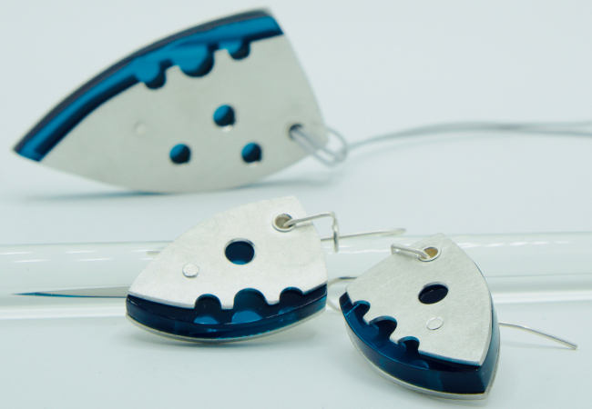Dhoek pewter and mirror blue earrings and pendant with cut out reveals
