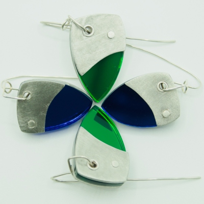 Dhoek mirror blue and mirror green earrings arranged in a flower motive