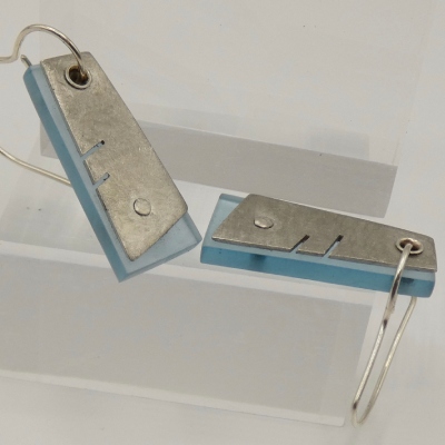 Hebbe earring pewter and frosted blue with slit cut outs and revealed tip