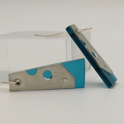 Hebbe earring pewter and teal, with circular cut outs and tip